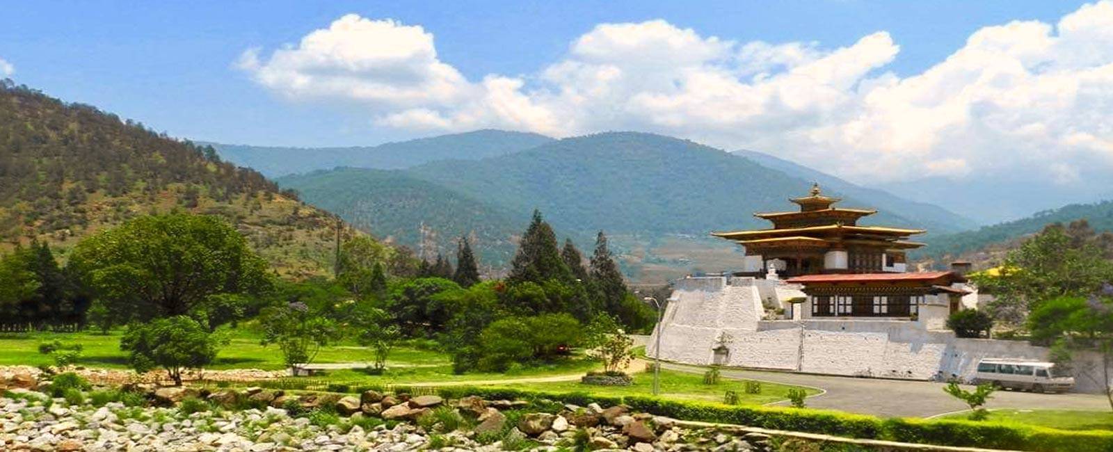The monastery in the middle part of the grassy land at Bhutan